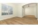 Spacious living room features wood floors, neutral paint, and ample natural light at 3835 Rock Hill Loop, Apopka, FL 32712