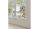 Bright window view overlooking the lake and landscape at 702 S Lake Adair Blvd, Orlando, FL 32804