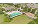 Aerial view of the community pool and recreation area, complete with a pool, playground, and clubhouse at 987 Alston Bay Blvd, Apopka, FL 32703