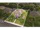 Aerial view of a beautifully landscaped property highlighting the well-manicured lawn, mature trees, and serene setting at 987 Alston Bay Blvd, Apopka, FL 32703