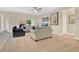Comfortable living room featuring neutral tones, a ceiling fan, and plenty of seating at 987 Alston Bay Blvd, Apopka, FL 32703