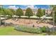 Community playground with swings, slides, and play structures offering a fun and safe environment for children at 987 Alston Bay Blvd, Apopka, FL 32703