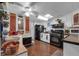 Functional kitchen with white cabinetry, laminate counters, and modern appliances, offering efficiency at 1000 E Anderson St, Orlando, FL 32801