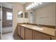 Bathroom features a double sink vanity and tiled shower/tub at 1018 Oceanbreeze Ct, Orlando, FL 32828