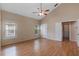 Bedroom features a vaulted ceiling, ceiling fan, and two windows at 1018 Oceanbreeze Ct, Orlando, FL 32828