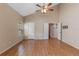 Spacious bedroom features a high ceiling, ceiling fan, and warm-toned walls at 1018 Oceanbreeze Ct, Orlando, FL 32828