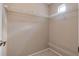 Walk-in closet with installed white shelving units and carpet at 1018 Oceanbreeze Ct, Orlando, FL 32828
