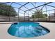 Inviting screened-in pool features clean water and backyard views for a refreshing experience at 1018 Oceanbreeze Ct, Orlando, FL 32828