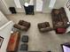 Open concept living room featuring a high ceiling, comfortable seating, and an abundance of natural light at 1021 Siena Park E Blvd # 301, Celebration, FL 34747