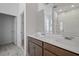 Modern bathroom featuring double sinks, sleek countertops, and a luxurious tiled shower at 1026 Vineyard Ridge Rd, Minneola, FL 34715