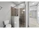 Bathroom featuring tiled glass shower and neutral paint at 10743 Belfry Cir, Orlando, FL 32832