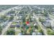 Aerial view of neighborhood shows location with a red pin drop marker at 1110 Virginia Ave, St Cloud, FL 34769