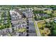 Aerial view of townhomes in a neighborhood close to shops, restaurants and apartments at 1123 Mahonia Ct, Lake Mary, FL 32746