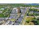 Aerial view of townhomes in a neighborhood close to shops, restaurants and apartments at 1123 Mahonia Ct, Lake Mary, FL 32746