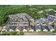 Aerial view of a neighborhood with well-maintained lawns and neatly arranged gray and white homes at 1123 Mahonia Ct, Lake Mary, FL 32746