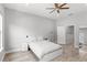 Bedroom with hardwood floors, ceiling fan and closet at 1123 Mahonia Ct, Lake Mary, FL 32746