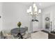 Cozy dining area featuring stylish chandelier and modern decor at 1123 Mahonia Ct, Lake Mary, FL 32746