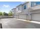 Contemporary townhome exterior with private garages at 1123 Mahonia Ct, Lake Mary, FL 32746