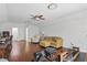 Bonus room features hardwood floors, a sitting area, ceiling fan and space for a home office at 11345 Preserve View Dr, Windermere, FL 34786