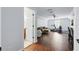 Bright bonus room with hardwood floors, comfortable seating, and exercise equipment near an attached bathroom at 11345 Preserve View Dr, Windermere, FL 34786