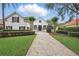 Charming home with a brick driveway and manicured landscaping at 11345 Preserve View Dr, Windermere, FL 34786