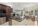 Open concept kitchen with a view to living room at 11345 Preserve View Dr, Windermere, FL 34786