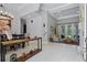 Open concept living room and dining room boasts marble flooring, high ceilings, and access to the lanai at 11345 Preserve View Dr, Windermere, FL 34786