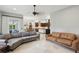 Open living area showcasing seamless transition from living space to kitchen and dining areas at 11345 Preserve View Dr, Windermere, FL 34786