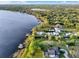 Beautiful lakefront homes surrounded by mature trees, offering privacy and scenic views at 12228 Kirby Smith Rd, Orlando, FL 32832