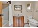 Bathroom featuring a vanity with a sink, a mirror, and a shower with a white curtain at 12228 Kirby Smith Rd, Orlando, FL 32832