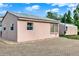 This detached garage has ample parking space with a paved driveway and easy access for vehicles and storage at 12228 Kirby Smith Rd, Orlando, FL 32832