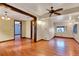 Inviting living room featuring hardwood floors, wood accents, and a cozy atmosphere at 12228 Kirby Smith Rd, Orlando, FL 32832