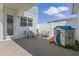 Outdoor patio features a playhouse, stylish seating, and a privacy fence perfect for relaxing at 1324 Painted Bunting Ave, Oakland, FL 34787