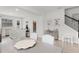 Modern kitchen features an island and views of the stairs and pantry at 1324 Painted Bunting Ave, Oakland, FL 34787