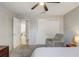 Bedroom with cozy chair at 1461 Sothell St, The Villages, FL 32162