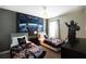 Themed bedroom with twin beds, Star Wars decor, and unique design elements for a fun, imaginative space at 1577 Mulligan Blvd, Davenport, FL 33896