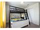 bedroom featuring a bunk bed with a whimsical Minion-themed decor, ideal for a fun and playful atmosphere at 1577 Mulligan Blvd, Davenport, FL 33896