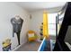 bedroom with a bunk bed, yellow chair, and a Minion themed decor creating a playful space at 1577 Mulligan Blvd, Davenport, FL 33896