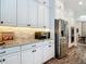 Beautiful kitchen with granite counters, stainless steel appliances and ample cabinet space at 16675 Otterchase Ln, Winter Garden, FL 34787