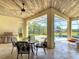 Outdoor patio features a covered dining area, barbecue, ceiling fan, and a view of the pool at 16675 Otterchase Ln, Winter Garden, FL 34787