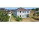 This is an aerial view showcasing the home's backyard and beautiful landscape at 1671 Thetford Cir, Orlando, FL 32824
