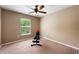 Neutral bedroom with carpet, a window bringing in natural light and ceiling fan at 2020 Corner Glen Dr, Orlando, FL 32820