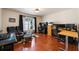 Spacious home office with hardwood floors, a window and several computer workstations at 2020 Corner Glen Dr, Orlando, FL 32820