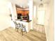 Open concept kitchen area boasts wood cabinets, black countertops and stainless steel appliances at 2528 Robert Trent Jones Dr # 1617, Orlando, FL 32835