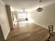 Bright and open floor plan featuring wood floors and lots of natural light at 2528 Robert Trent Jones Dr # 1617, Orlando, FL 32835