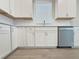 Modern kitchen showcases white cabinets, subway tile backsplash and stainless steel appliances at 2731 Forestdale St, St Cloud, FL 34771