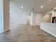 Bright open-concept living room boasts hardwood floors and ample space at 2731 Forestdale St, St Cloud, FL 34771