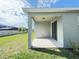 Spacious covered patio with access to the backyard through sliding glass doors at 2731 Forestdale St, St Cloud, FL 34771