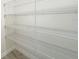 A tidy walk-in closet is equipped with adjustable wire shelving, adding convenience to storage solutions at 2731 Forestdale St, St Cloud, FL 34771