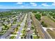 Aerial street view of a community showcasing homes and landscaping, highlighting the neighborhood's layout at 2795 Westyn Cove Ln, Ocoee, FL 34761